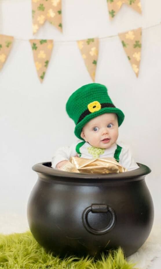 Baby with shamrock decorations